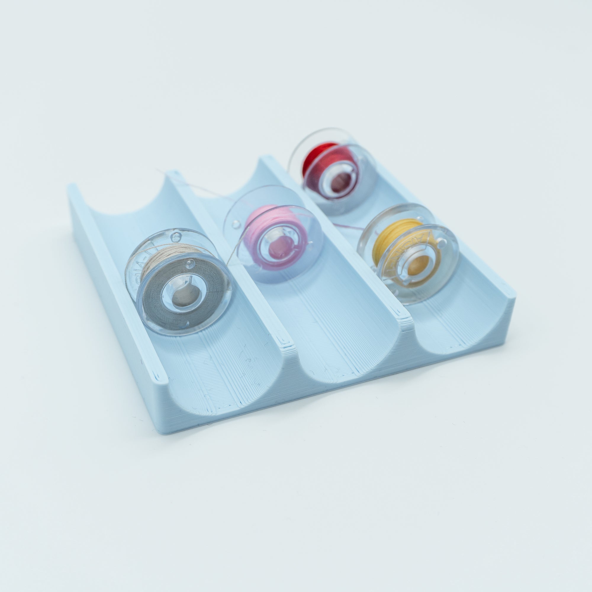 2x2 Unterfadenspulen-Einsatz